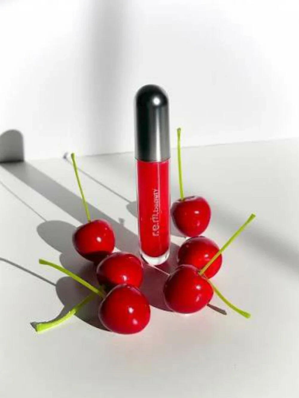 🍒Lip Need🍒BNIB REM Beauty By Ariana Grande Fullsize SHIRLEY Glossy Lip Balm!